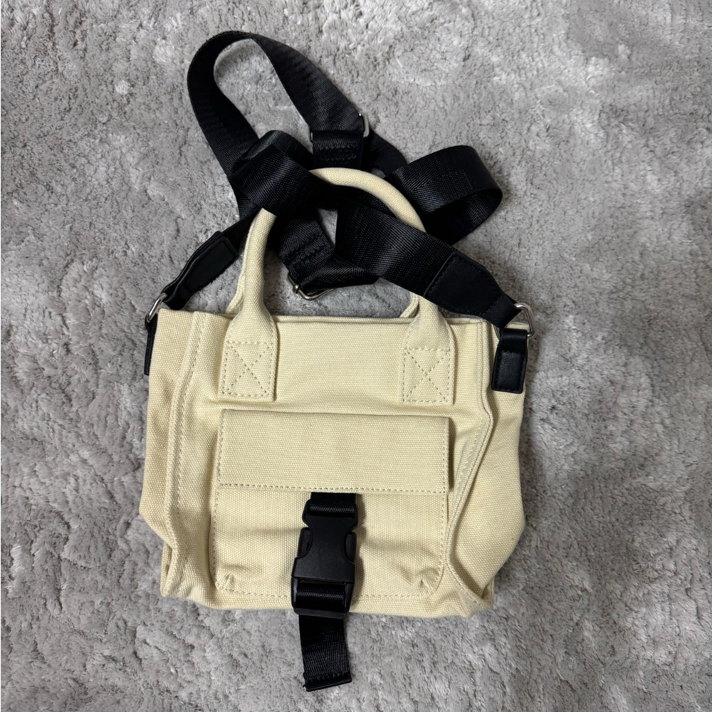 Tan crossbody bag.